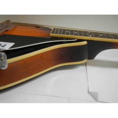 594 - An 8 string Tanglewood teardrop mandolin.