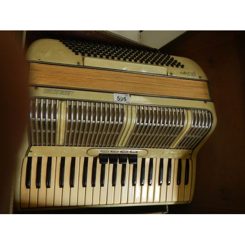 596 - An L Busk Acchio accordion in very good condition and working order.