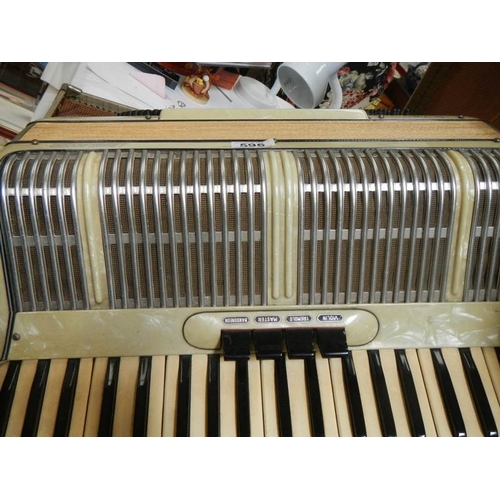 596 - An L Busk Acchio accordion in very good condition and working order.