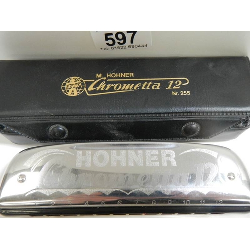 597 - A Hohner Chrometta 12 harmonica.