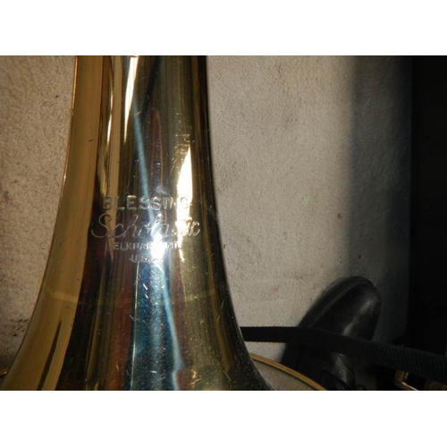 600 - A cased trombone by Blessing Scholastic, Made in U.S.A.