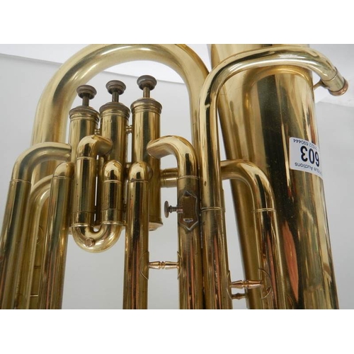 603 - A Lark brass euphonium, No. M4052 complete with mouthpiece, 24'' long.