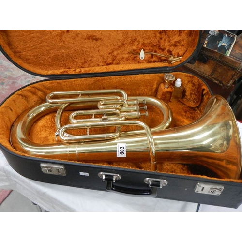 603 - A Lark brass euphonium, No. M4052 complete with mouthpiece, 24'' long.