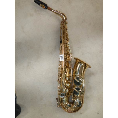 608 - A Thorn Trevor James & Co., alto saxaphone, lacquer worn but otherwise in good condition.