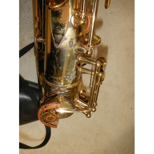 608 - A Thorn Trevor James & Co., alto saxaphone, lacquer worn but otherwise in good condition.