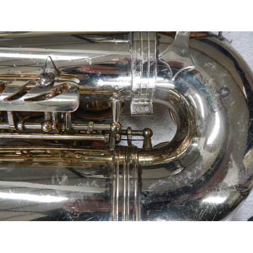 608 - A Thorn Trevor James & Co., alto saxaphone, lacquer worn but otherwise in good condition.