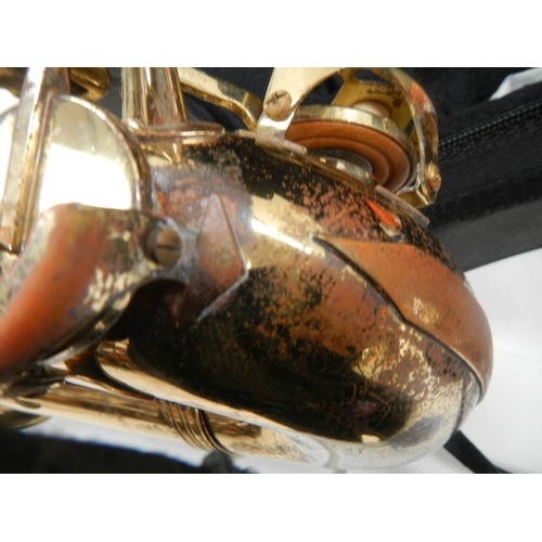 608 - A Thorn Trevor James & Co., alto saxaphone, lacquer worn but otherwise in good condition.