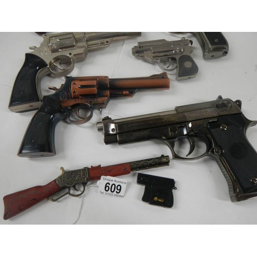 609 - A quantity of replica hand guns.