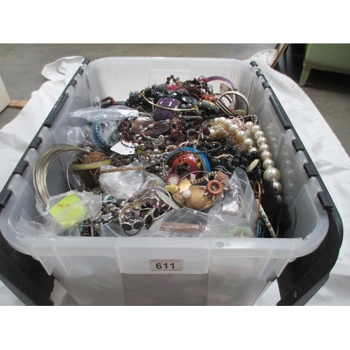 611 - A very large collection of unsorted costume jewellery, (crate not included)