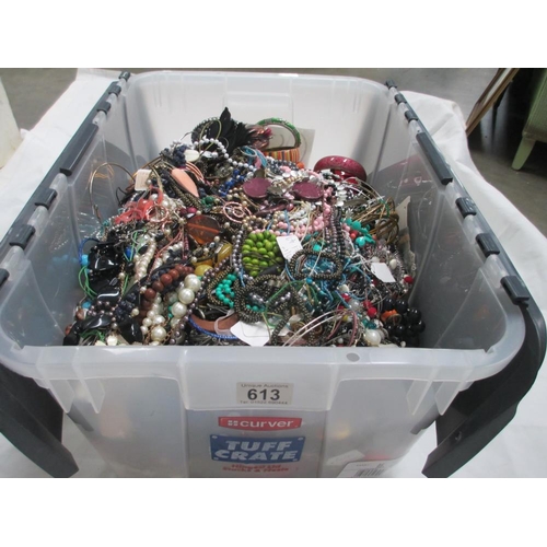 613 - A very large collection of unsorted costume jewellery,  (crate not included)