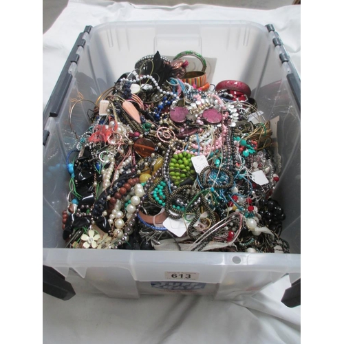 613 - A very large collection of unsorted costume jewellery,  (crate not included)