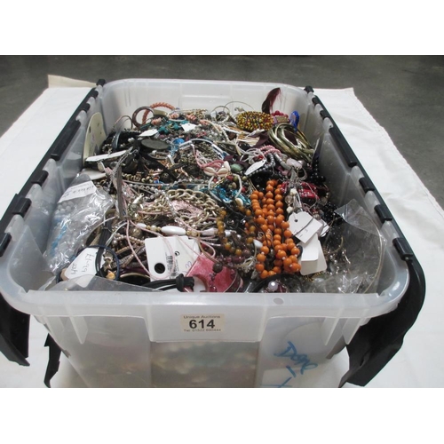 614 - A very large collection of unsorted costume jewellery.  (crate not included)