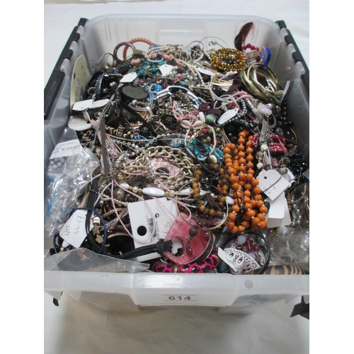 614 - A very large collection of unsorted costume jewellery.  (crate not included)