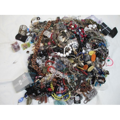 615 - A very large collection of unsorted costume jewellery. (crate not included).