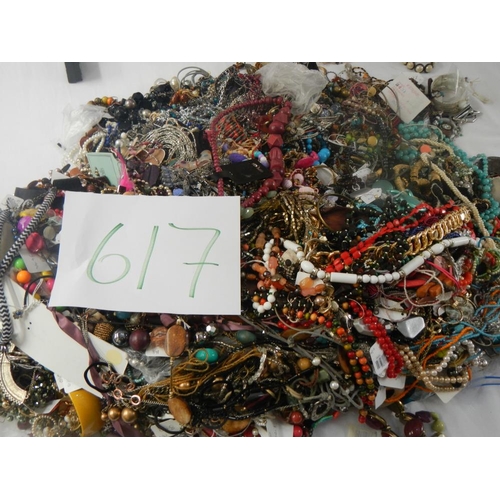 617 - A very large collection of unsorted costume jewellery. (crate not included)