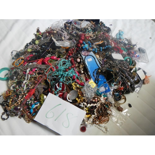 618 - A very large collection of unsorted costume jewellery. (crate not included)