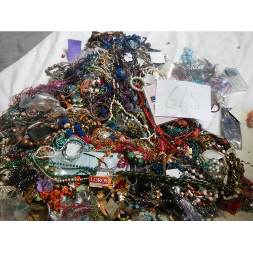 618 - A very large collection of unsorted costume jewellery. (crate not included)