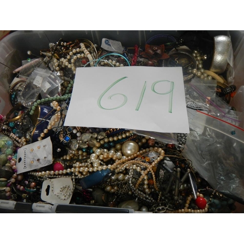 619 - A very large collection of unsorted costume jewellery. (crate not included)