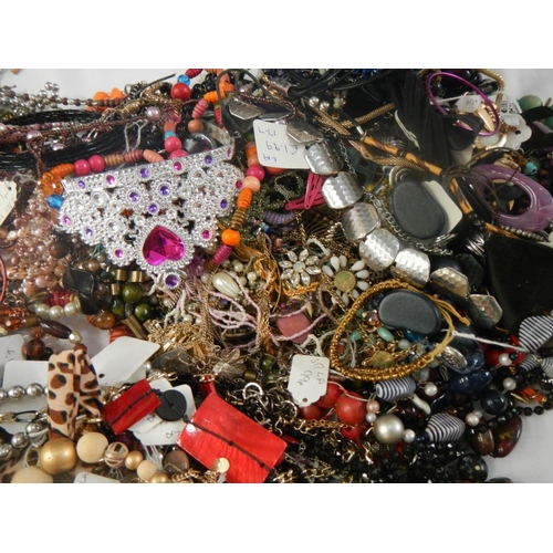 620 - A very large collection of unsorted costume jewellery. (crate not included).