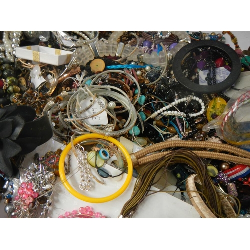 624 - A very large collection of unsorted costume jewellery (crate not included)