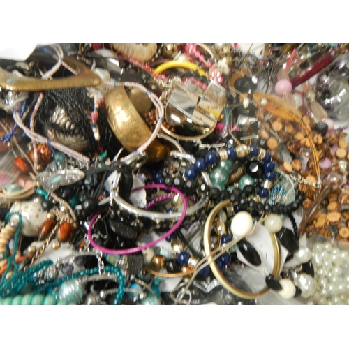 624 - A very large collection of unsorted costume jewellery (crate not included)