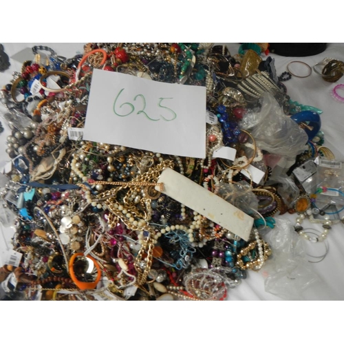 625 - A very large collection of unsorted costume jewellery (crate not included)