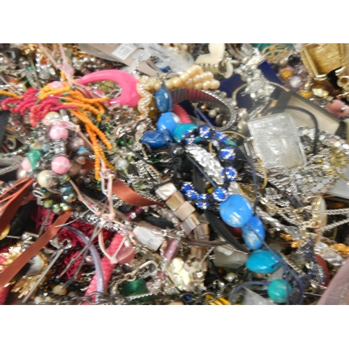 625 - A very large collection of unsorted costume jewellery (crate not included)