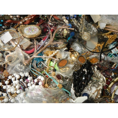 625 - A very large collection of unsorted costume jewellery (crate not included)