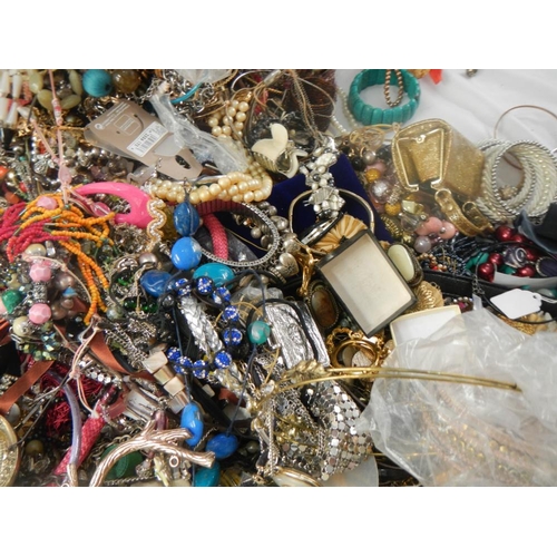 625 - A very large collection of unsorted costume jewellery (crate not included)