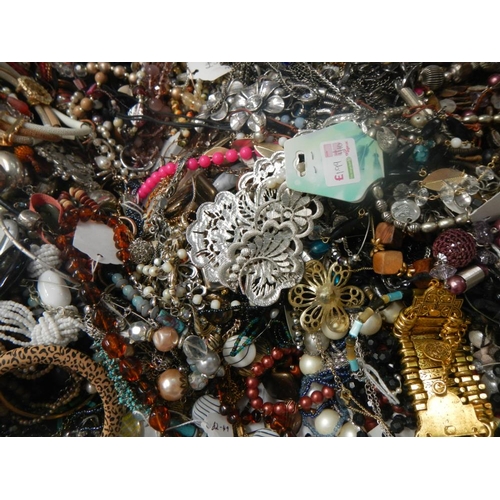 626 - A very large collection of unsorted costume jewellery (crate not included)