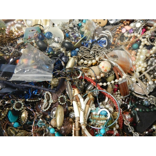 626 - A very large collection of unsorted costume jewellery (crate not included)