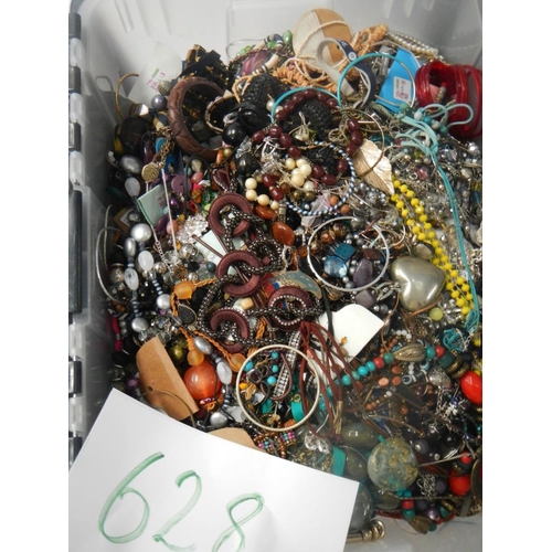 628 - A very large collection of unsorted costume jewellery (crate not included)