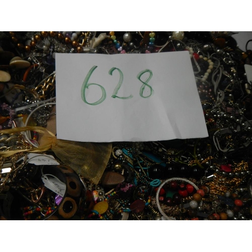 628 - A very large collection of unsorted costume jewellery (crate not included)