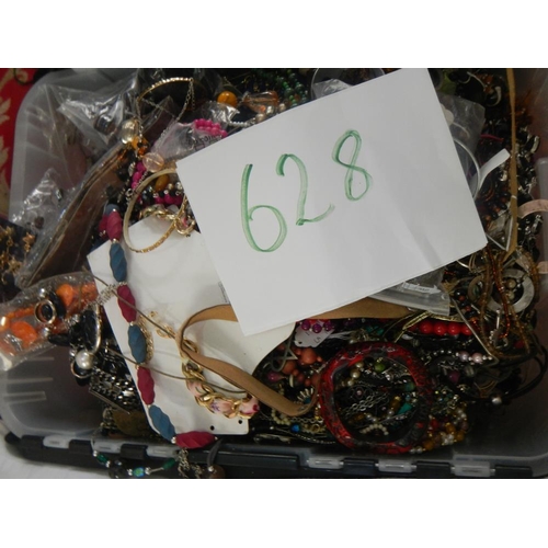 628 - A very large collection of unsorted costume jewellery (crate not included)