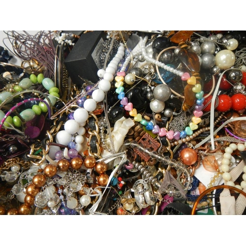 628 - A very large collection of unsorted costume jewellery (crate not included)