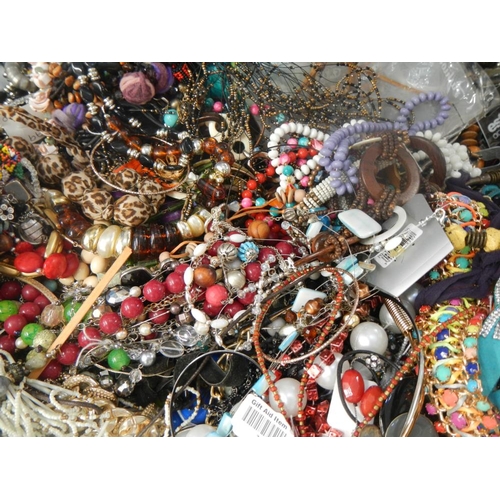 629 - A very large collection of unsorted costume jewellery (crate not included)