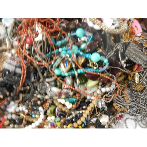 629 - A very large collection of unsorted costume jewellery (crate not included)