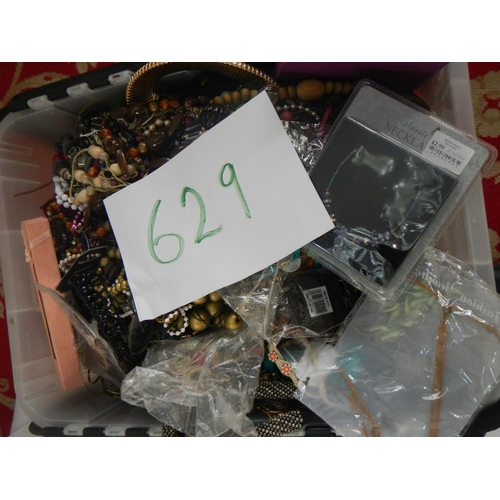 629 - A very large collection of unsorted costume jewellery (crate not included)