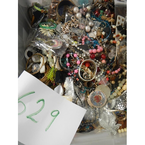 629 - A very large collection of unsorted costume jewellery (crate not included)