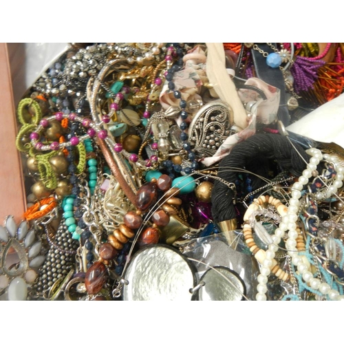 629 - A very large collection of unsorted costume jewellery (crate not included)