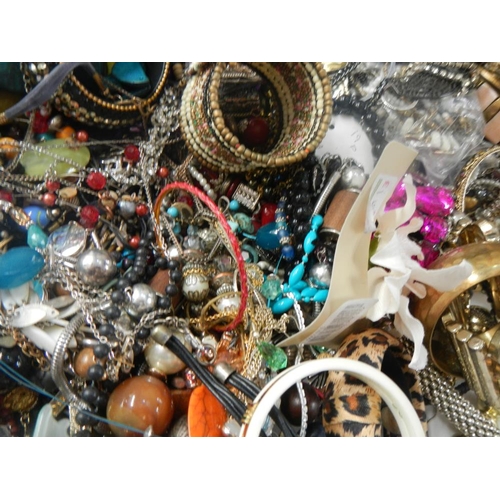 630 - A very large collection of unsorted costume jewellery (crate not included)