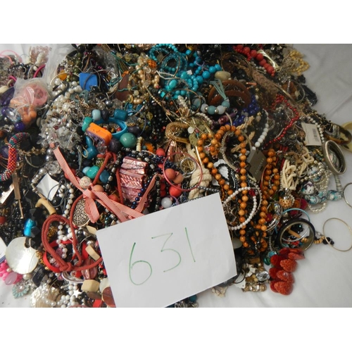 631 - A very large collection of unsorted costume jewellery  (crate not included)