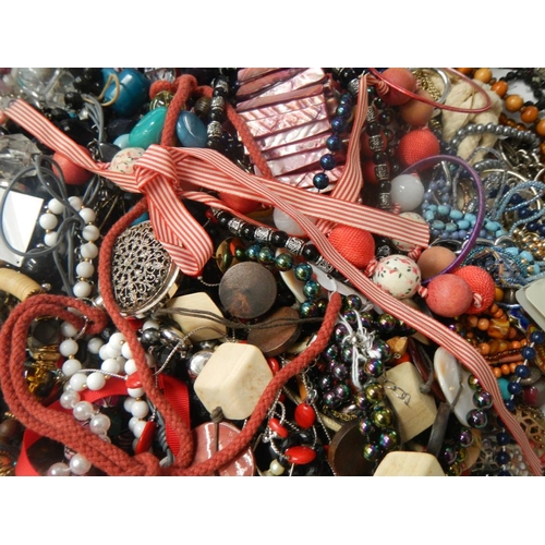 631 - A very large collection of unsorted costume jewellery  (crate not included)