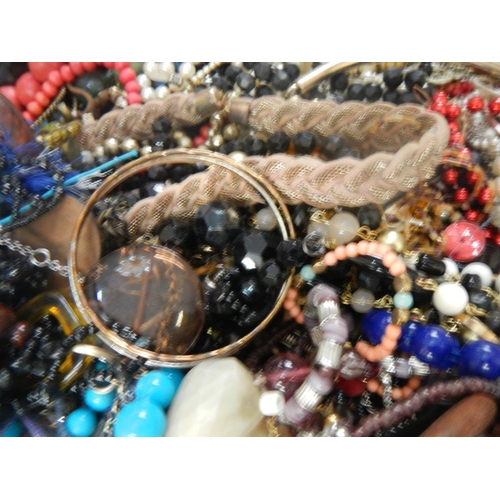 631 - A very large collection of unsorted costume jewellery  (crate not included)