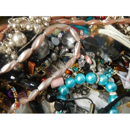 632 - A very large collection of unsorted costume jewellery (crate not included)