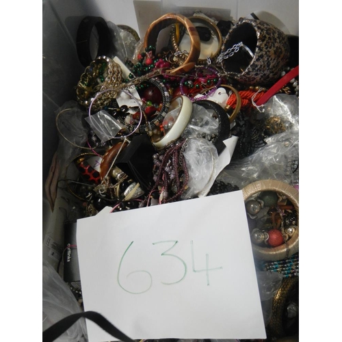 634 - A very large collection of unsorted costume jewellery  (crate not included)