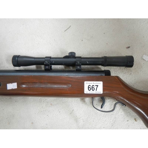 667 - An air rifle with sight SMK - Sports Marketing Model STB2K.