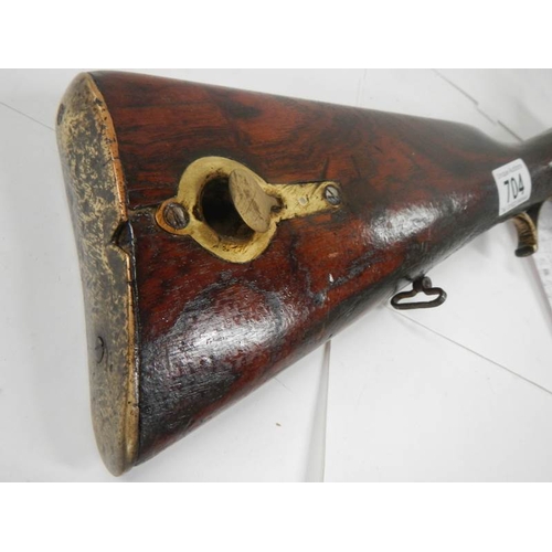 704 - An original percussion rifle in good condition.