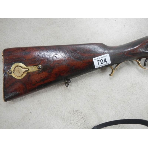 704 - An original percussion rifle in good condition.