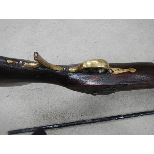 704 - An original percussion rifle in good condition.